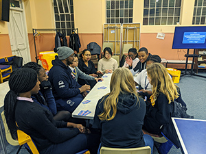 Group of young people around a table
