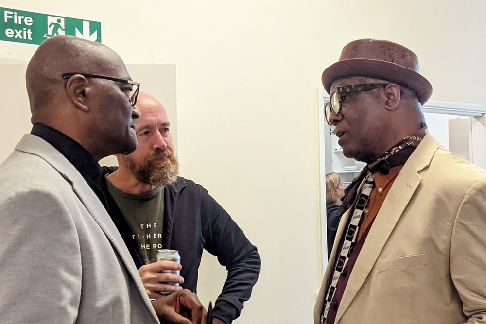 Bishop Lenford Rowe in discussion